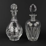 Val Saint-Lambert, a set of 2 carafes made of clear cut glass. (25,5 x 11cm)