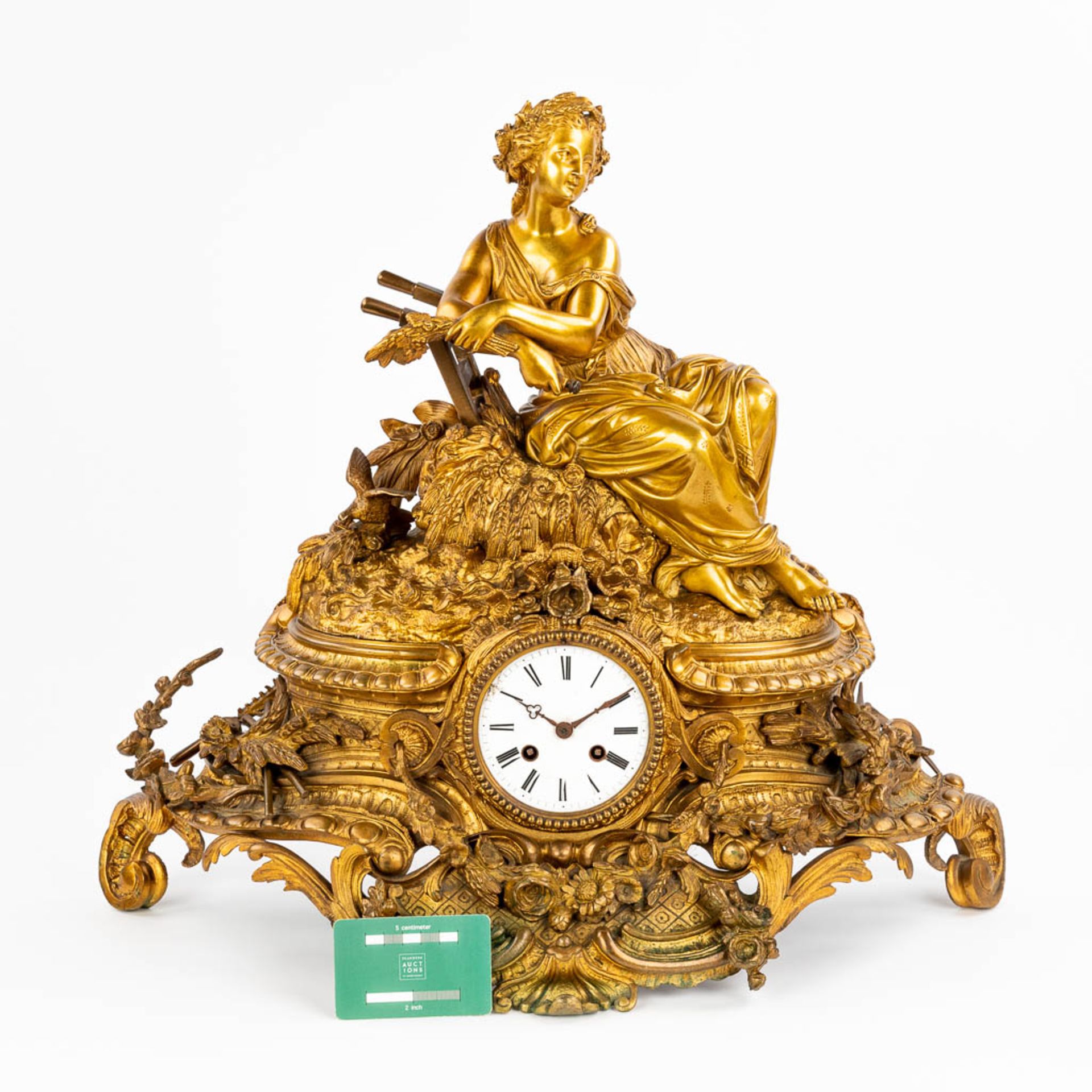 A mantle clock 'The Harvest' with an image of a resting lady. (22 x 59 x 50cm) - Image 5 of 15