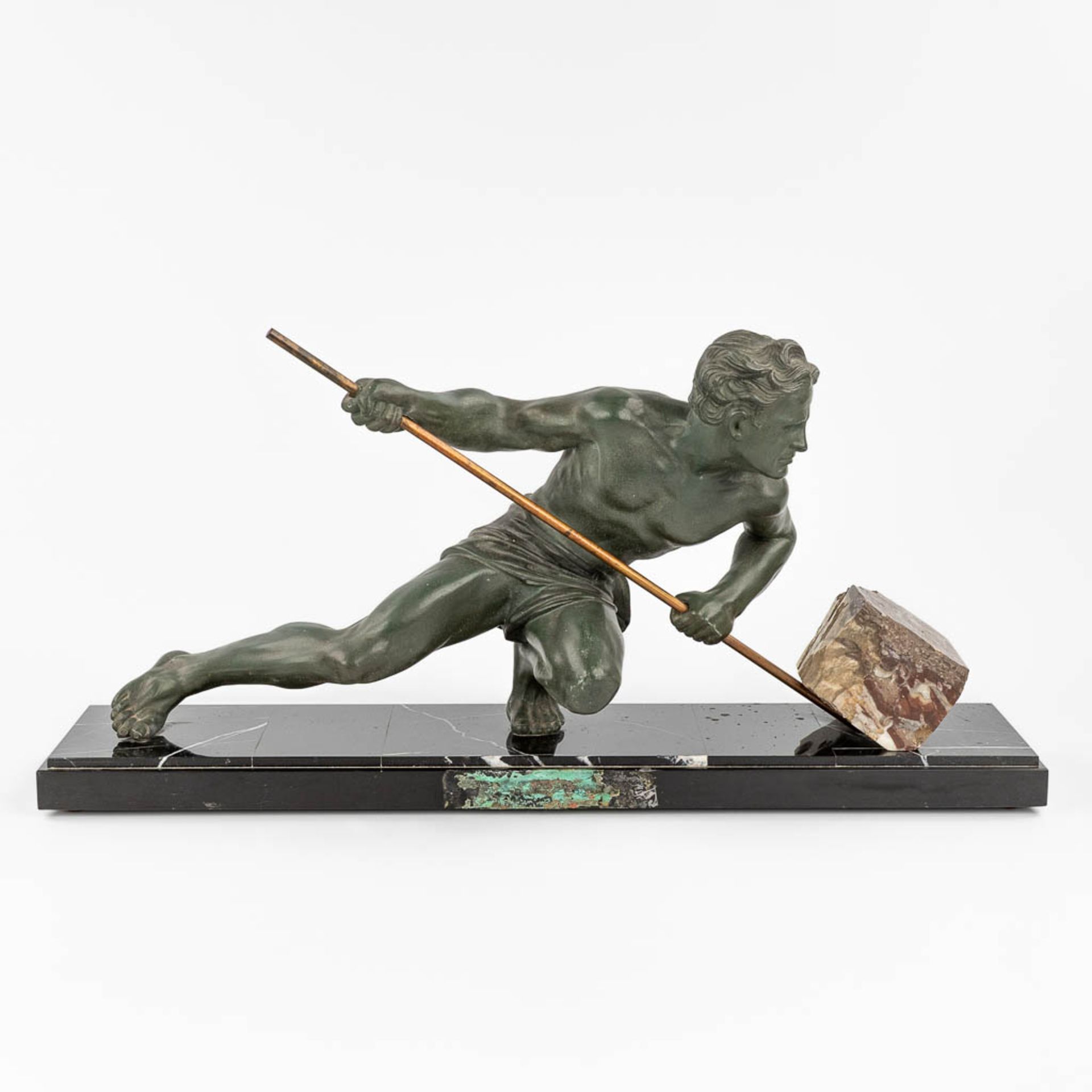 Gustave BUCHET (1888-1963) 'The Athlete' a statue made of spelter on a marble stand. (20 x 74 x 36cm