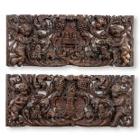 A pair of antique wood sculptured panels, Baroque, richly decorated with putti. (11 x 137 x 55cm)