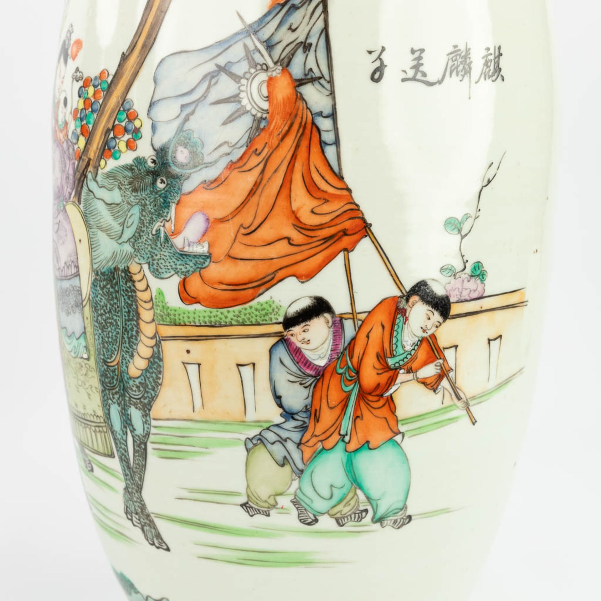 A pair of Chinese vases made of porcelain and decorated with mythological figurines. (58 x 22 cm) - Image 11 of 13