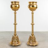 A pair of gothic revival planters on a stand, made of polished copper. (127 x 35cm)