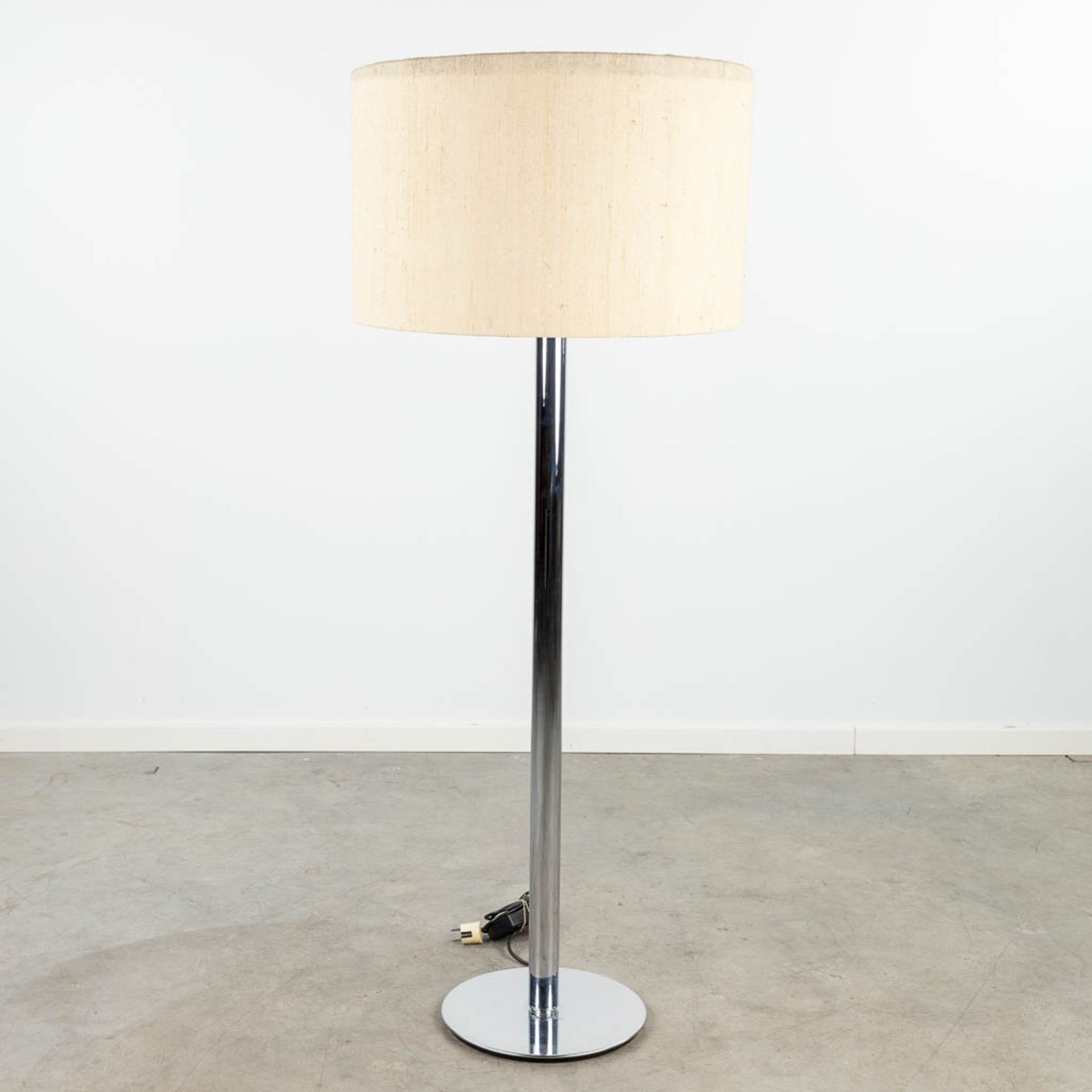 A mid-C. floor lamp with original lampshade, Germany, circa 1960. (150 x 34cm)