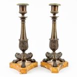 A pair of candlesticks made of bronze and mounted on an onyx base. Empire period (9,5 x 9,5 x 25,7cm