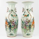 A pair of Chinese vases made of porcelain and decorated with mythological figurines. (58 x 22 cm)