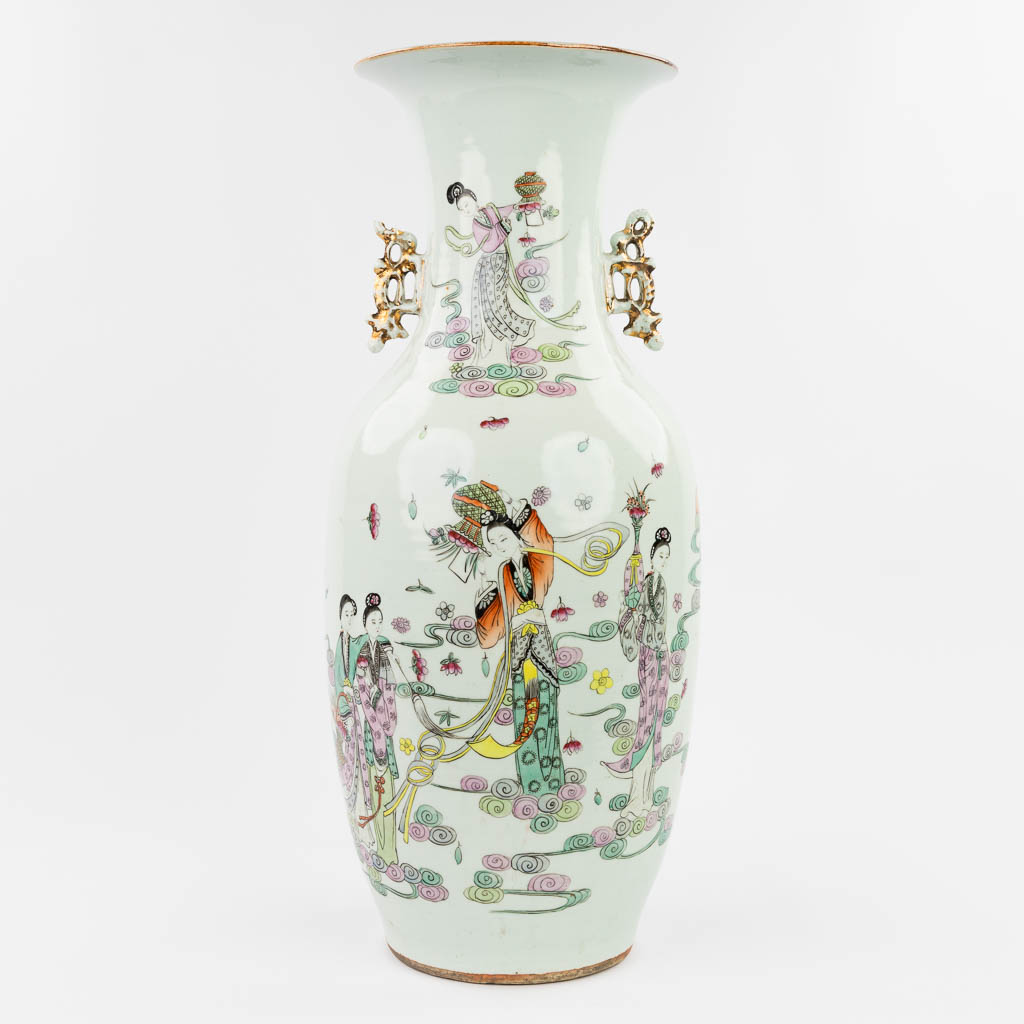 A Chinese vase made of porcelain and decorated with ladies. (57 x 24 cm)