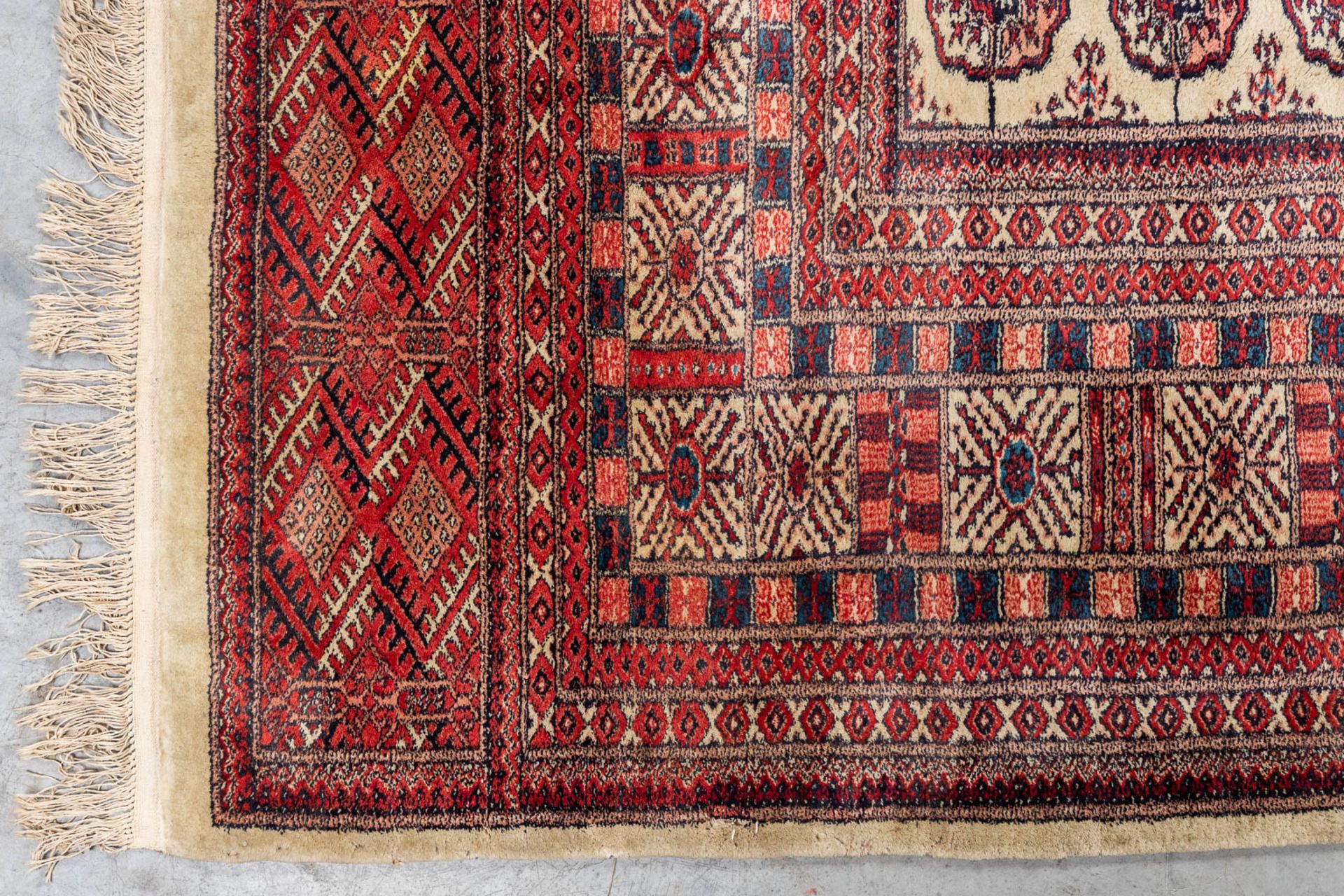 An Oriental hand-made carpet, Bokhara. (340 x 260 cm) - Image 9 of 9