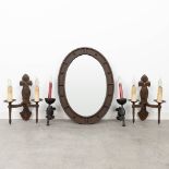 A collection of 4 wall lamps and a mirror made of cast iron. (47 x 64cm)