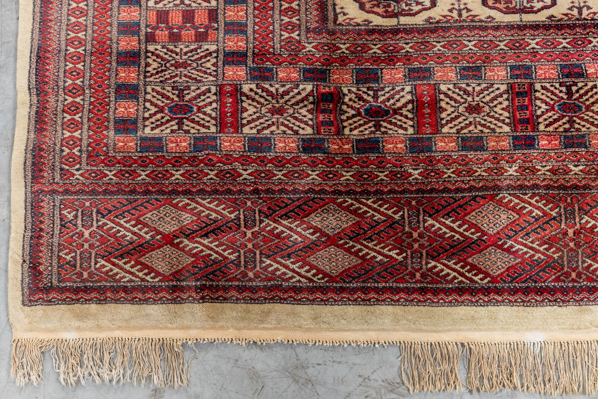 An Oriental hand-made carpet, Bokhara. (340 x 260 cm) - Image 5 of 9