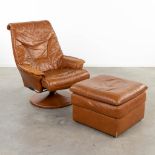 A mid-C. design chair, made of cognac brown leather,Êwith a matching ottoman (88 x 80 x 95cm)