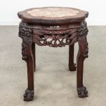 An oriental hardwood stand, finished with a marble top. (41 x 46 cm)