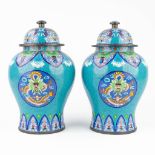 A pair of baluster vases with lid and decorated with cloisonnŽ email. (39 x 24 cm)