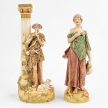 Royal Dux, a collection of 2 figurines 'Flute player' and 'Water Carrier' (36,5cm)