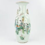 A Chinese vase decorated with a hand-painted decor of ladies. (57 x 23 cm)
