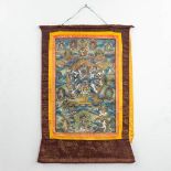 An Oriental Thangka made of hand-painted silk. (60 x 90 cm)