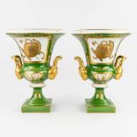 Porcelaine De Couleuvre, a pair of porcelain vases with hand-painted decor. (37 x 27,5cm)