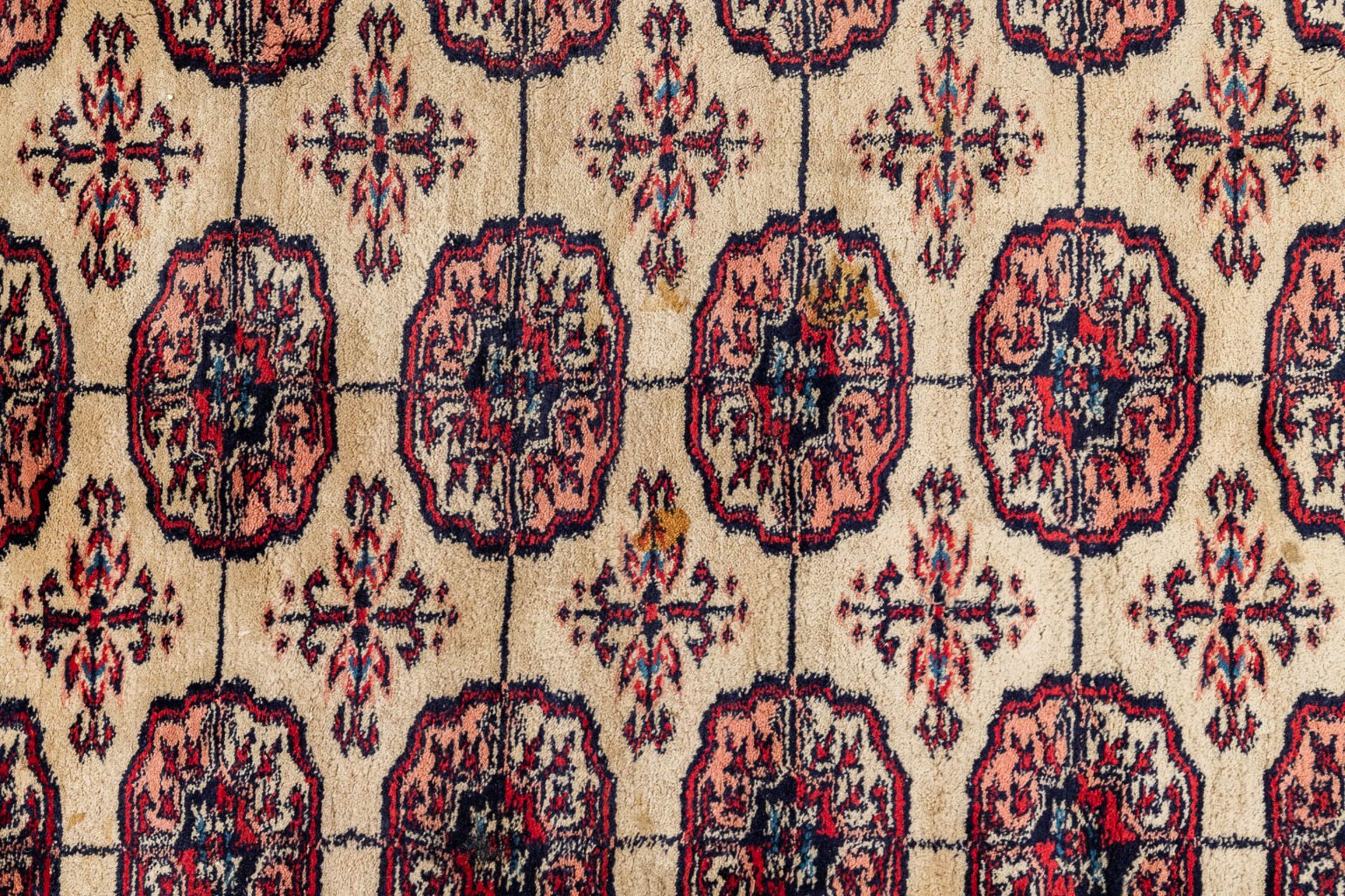 An Oriental hand-made carpet, Bokhara. (340 x 260 cm) - Image 4 of 9