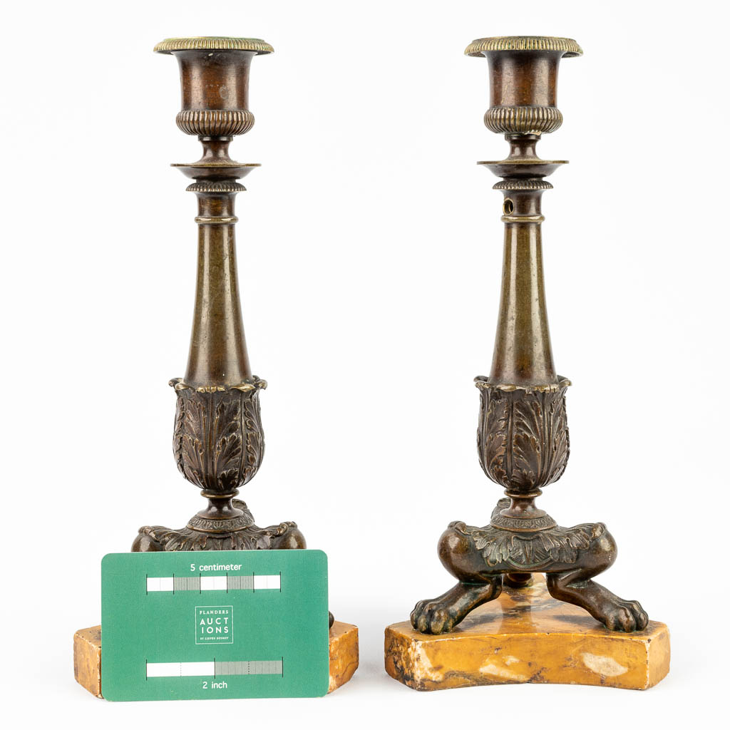 A pair of candlesticks made of bronze and mounted on an onyx base. Empire period (9,5 x 9,5 x 25,7cm - Image 5 of 13