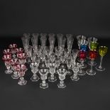 A collection of glasses and goblets, with coloured and clear glass. (19cm)