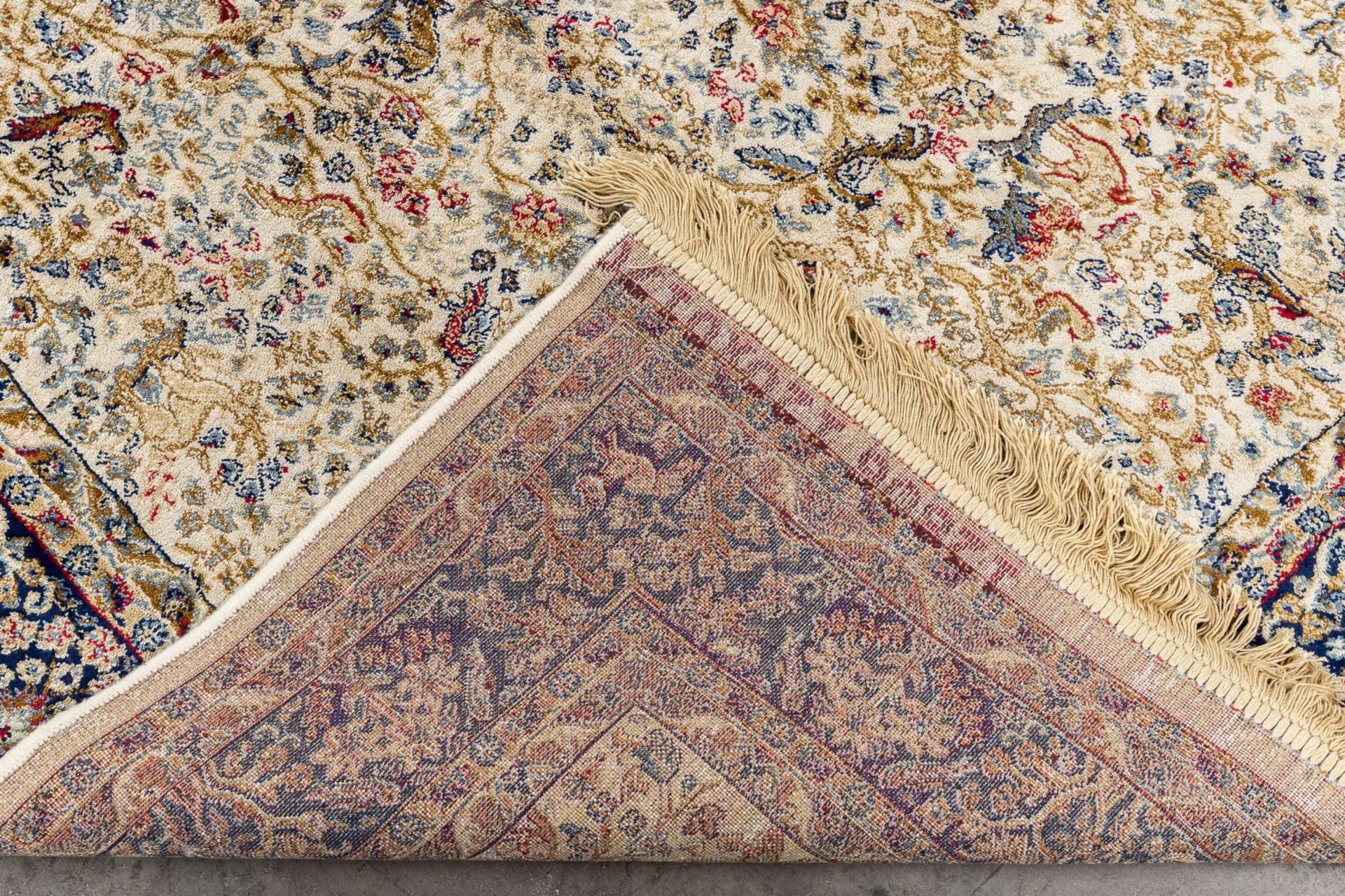 A collection of 5 machine made carpets, made of silk and wool. 20th C. - Image 6 of 39