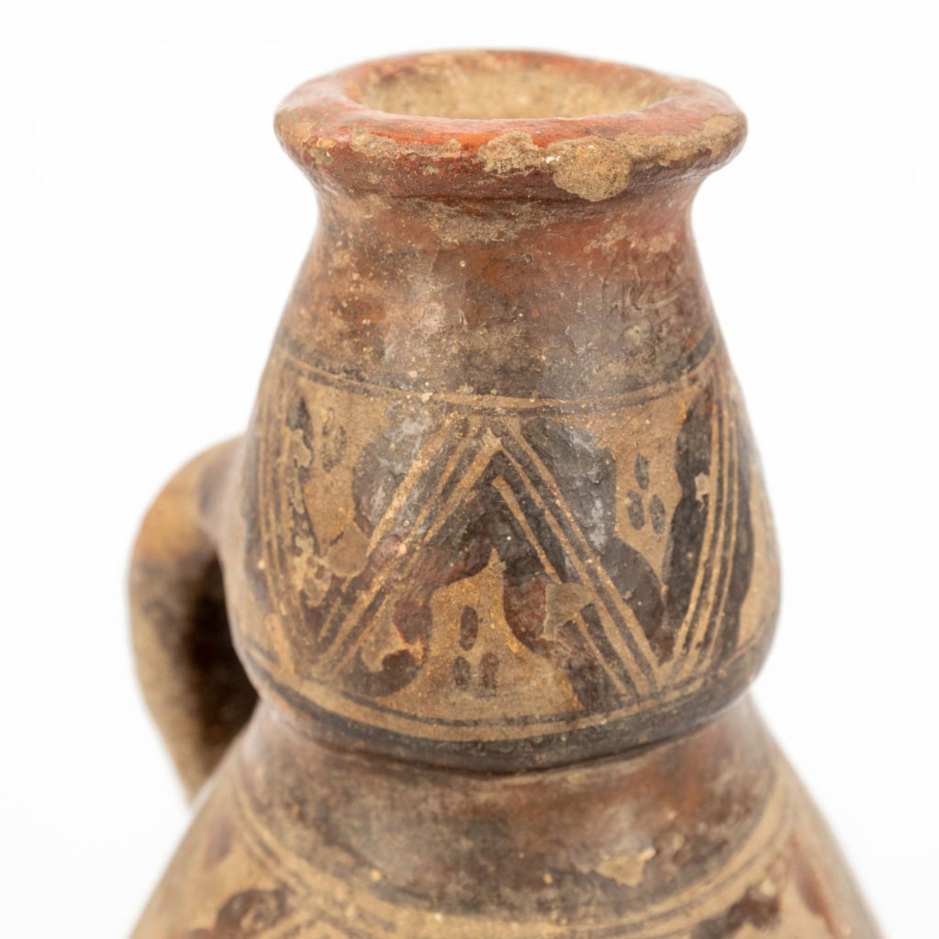 A vase probably of Northern African origin. (24 x 15cm) - Image 11 of 14