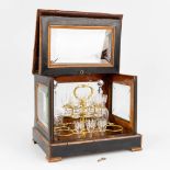 An antique tantalus set made of wood and glass (27 x 35 x 30cm)