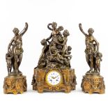 A three-piece mantle garniture clock decorated with ladies and putti (24 x 33 x 51cm)