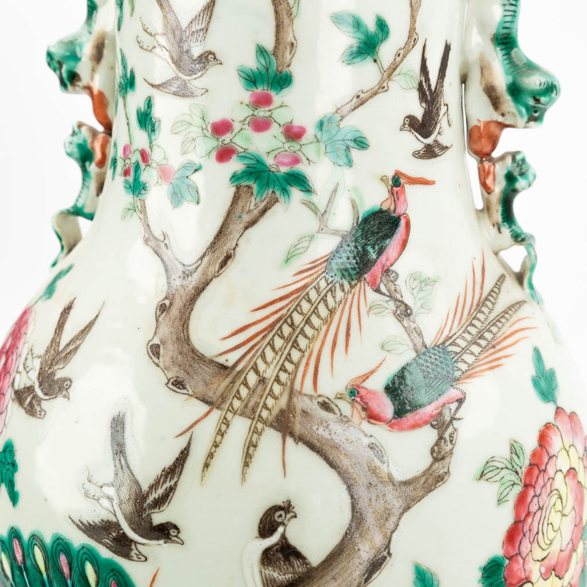 A Chinese vase made of porcelain, decorated with peacocks and birds. (61,5 x 24 cm) - Image 12 of 18