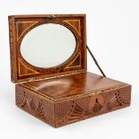 An antique writing box made of sculptured wood and decorated with marquetry inlay. (21 x 29 x 10cm)
