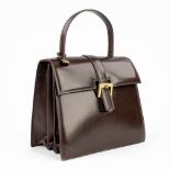 Delvaux, a handbag made of brown leather (8 x 23 x 30cm)