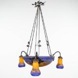 Muller Frres, a p‰te de verre and wrought iron chandelier in art deco style. (75 x 56cm)