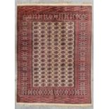 An Oriental hand-made carpet, Bokhara. (340 x 260 cm)