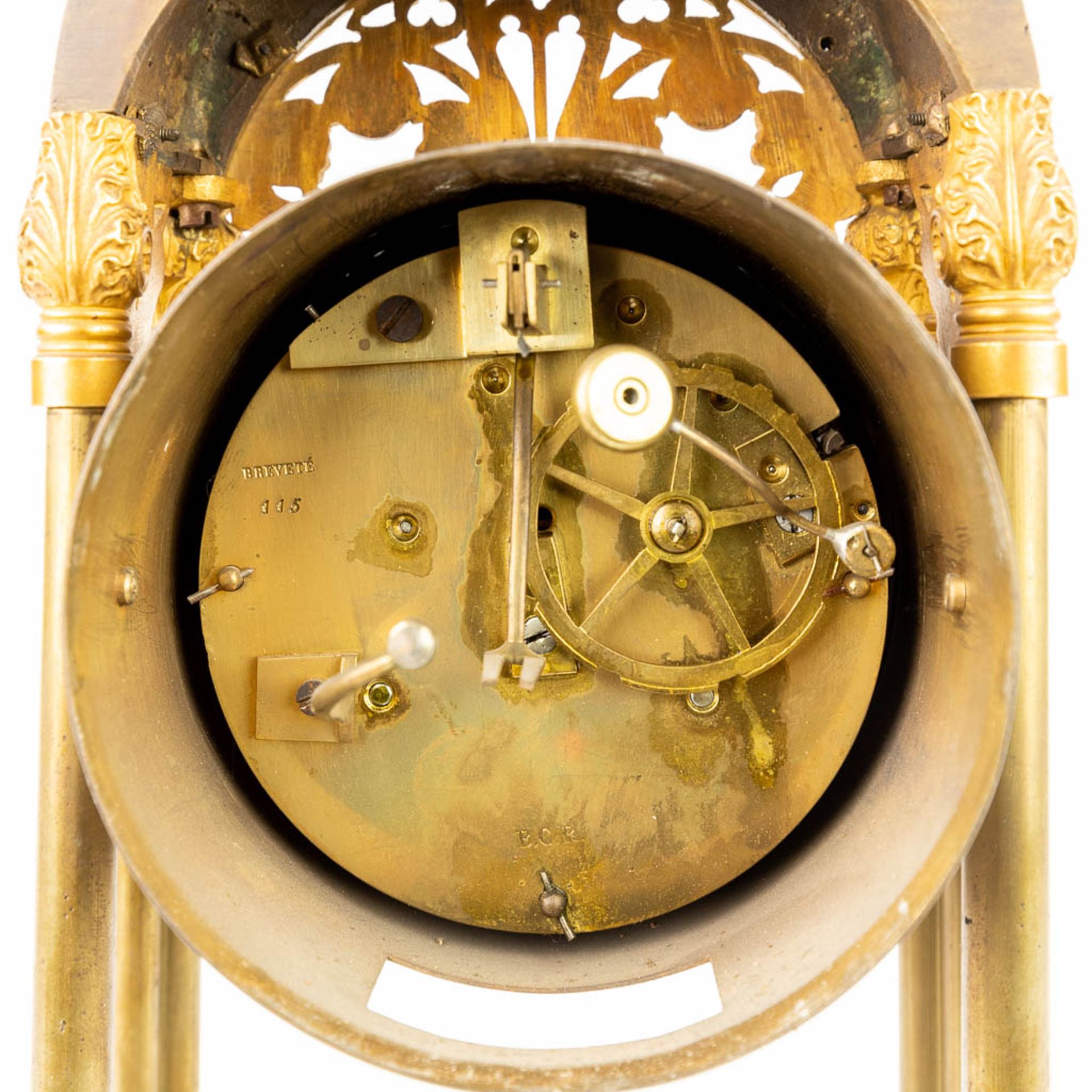 A table column clock made of gilt bronze in a gothic revival style. (11 x 19,5 x 43cm) - Image 12 of 15