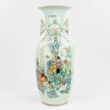 A Chinese vase made of porcelain and decorated with peaches, the Emperor and calligraphic texts. (57