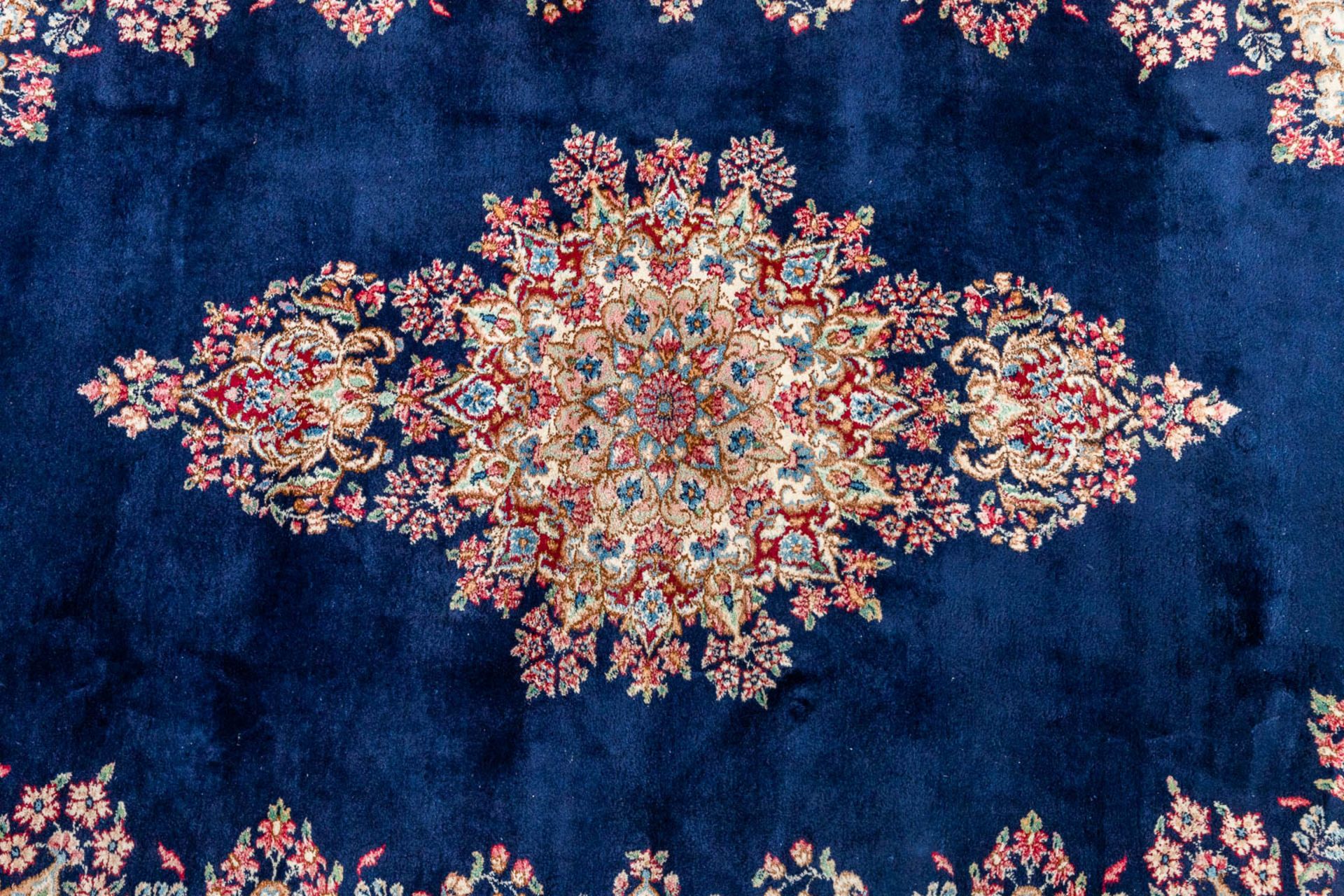 An Oriental hand-made carpet, Kerman. (310 x 215 cm) - Image 2 of 7