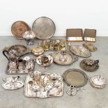 A large collection of silver-plated items.