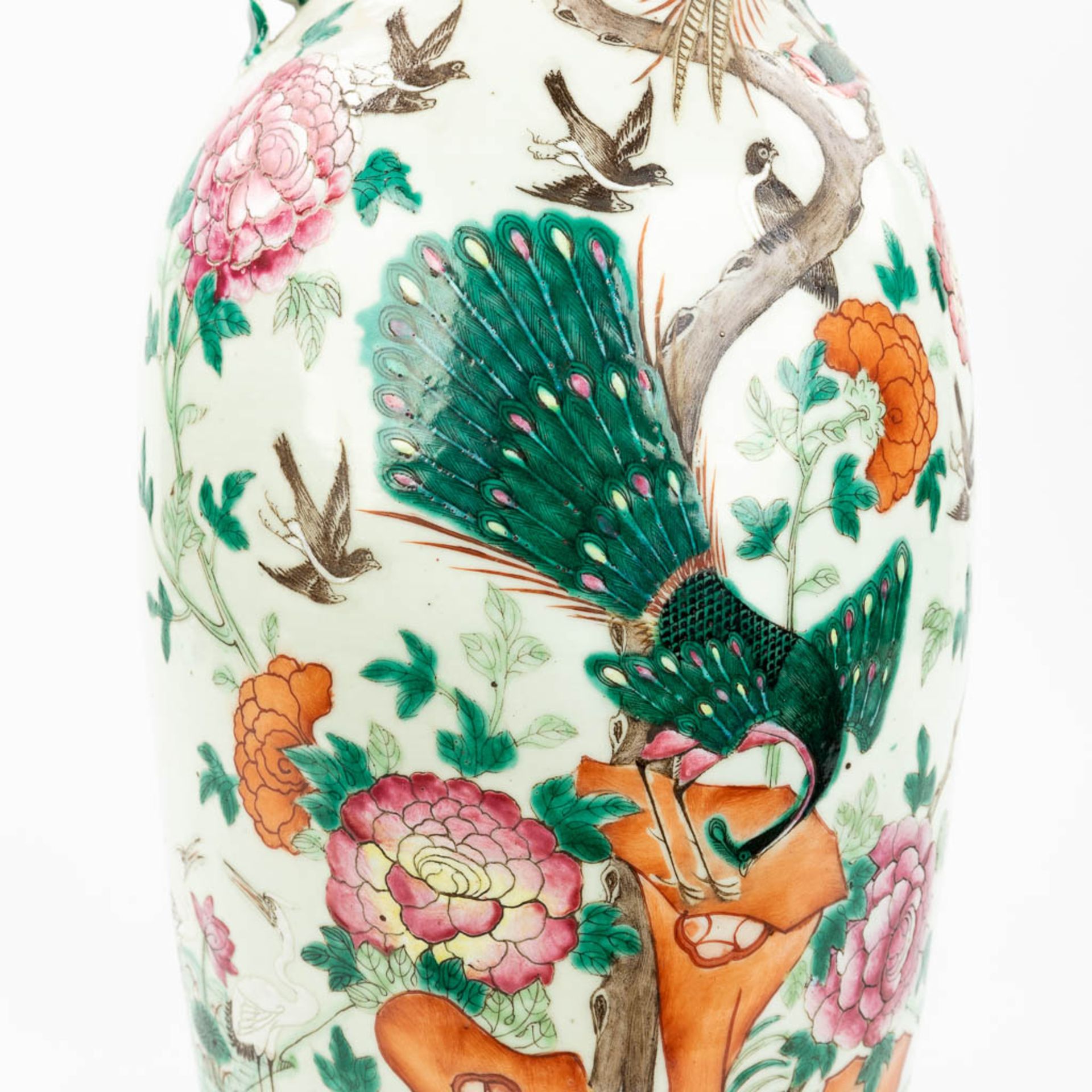 A Chinese vase made of porcelain, decorated with peacocks and birds. (61,5 x 24 cm) - Image 17 of 18