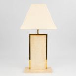 Camille BREESCHE (XX) a travertine table lamp with gold-plated metal parts. (10 x 26 x 44cm)