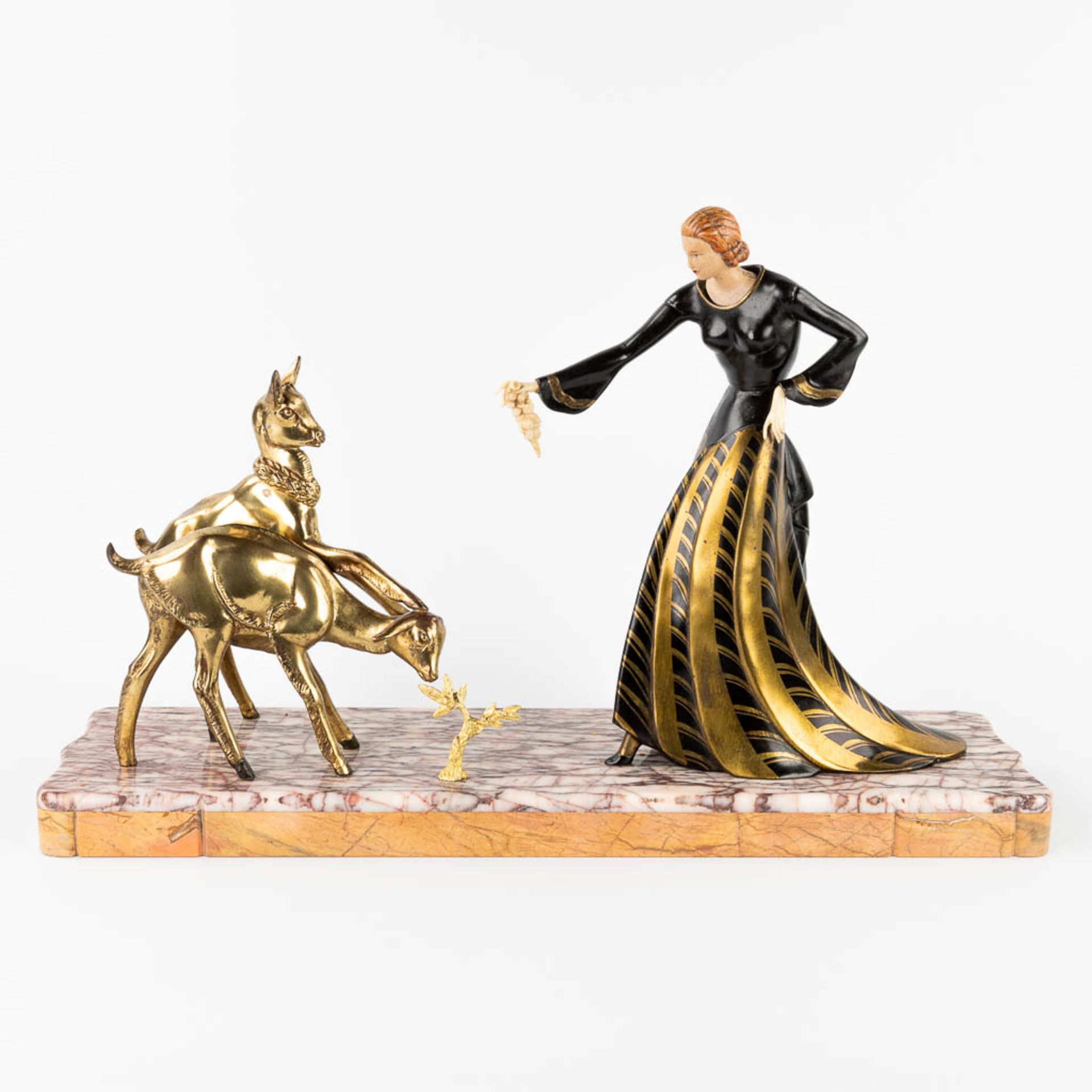 Lady with deer, a statue made in art deco style. (L:17 x W:65 x H:42 cm)