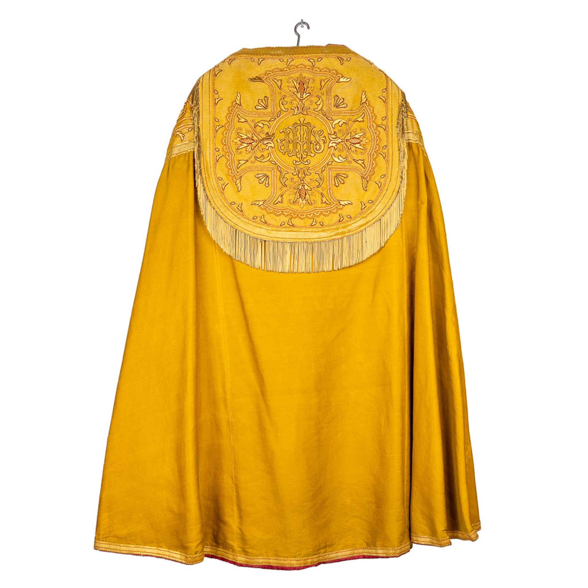 An antique Cope decorated with thick gold-threaded embroidery (H:130 cm)