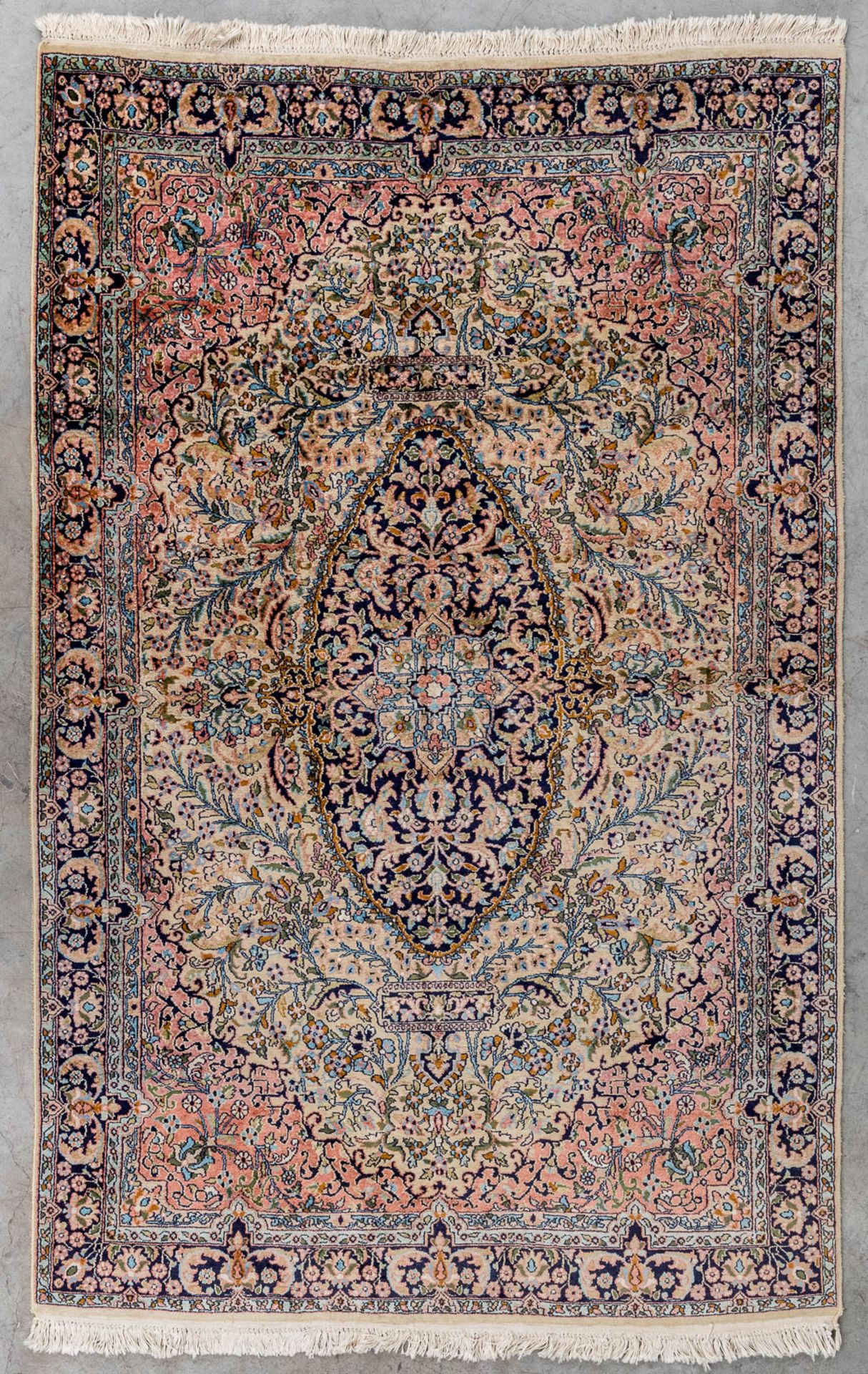 An Oriental hand-made carpet, Kashan. (L:190 x W:100 cm)