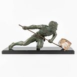 Gustave BUCHET (1888-1963) 'The Effort' an art deco statue made of spelter. (L:26 x W:74 x H:39 cm)