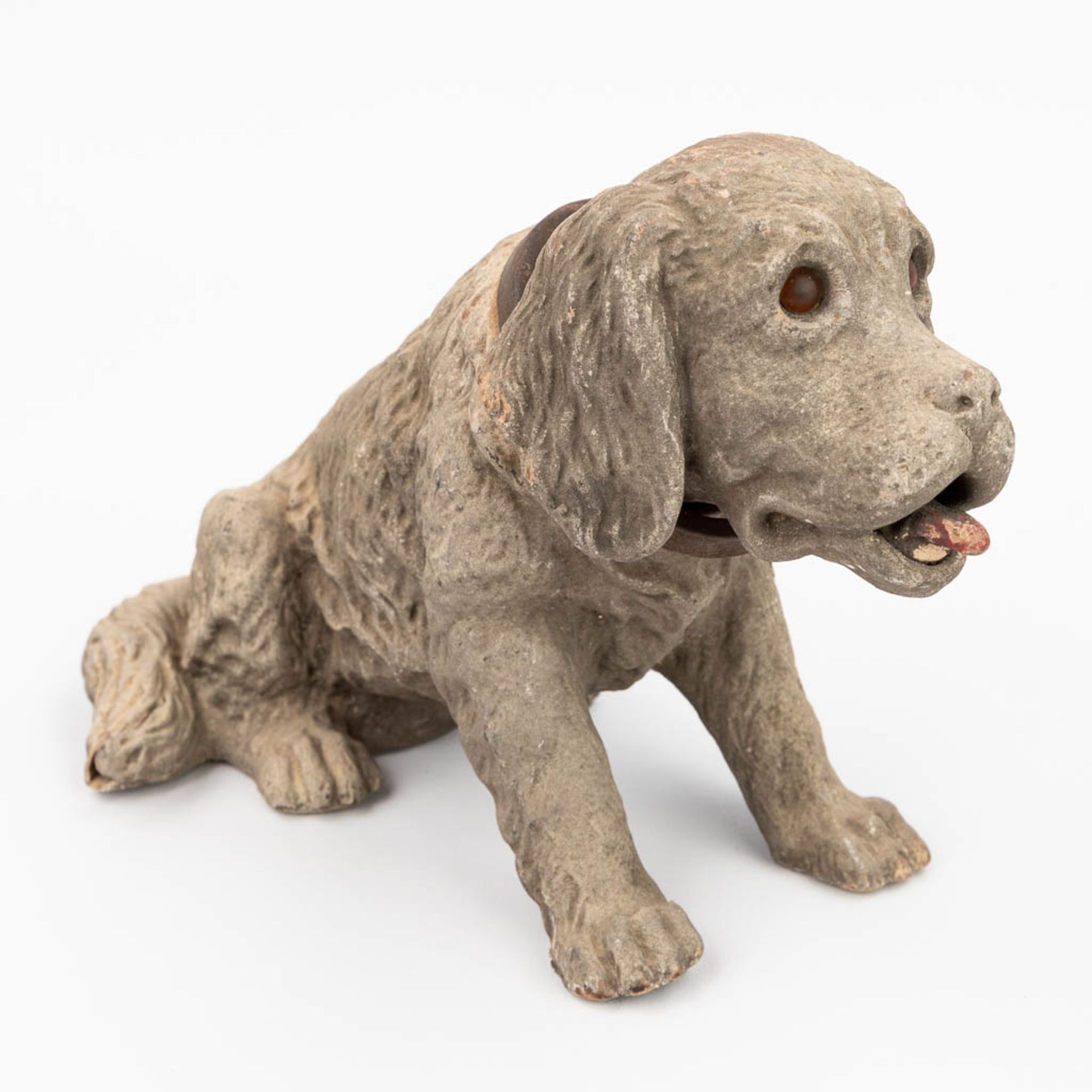 An antique 'Nodding Dog', papier machŽ. Circa 1900. (W:25 x H:17 cm)