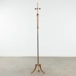 A mid-century floor lamp made of brass and bronze. Circa 1950. (H:162 cm)