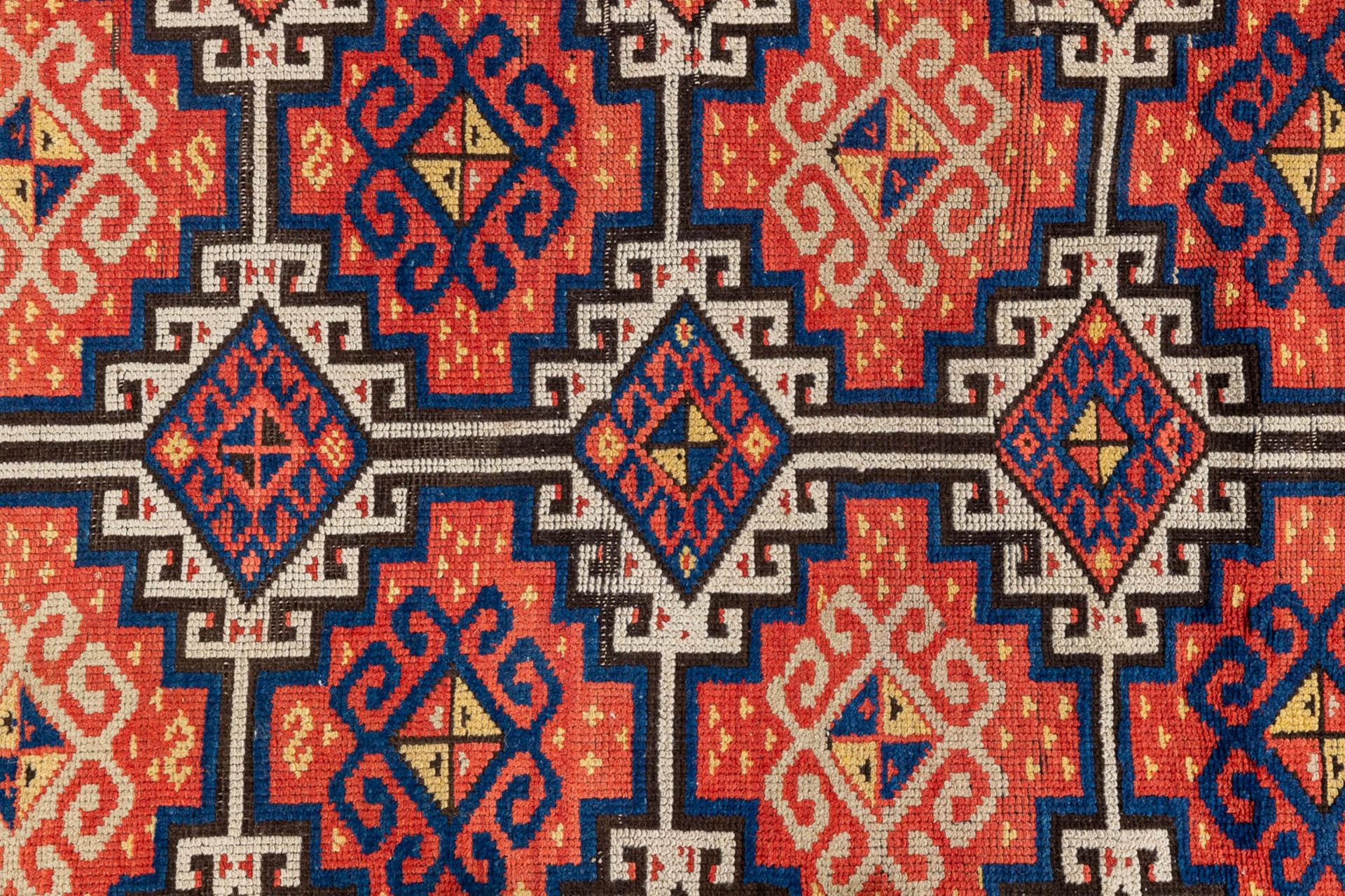 An oriental hand-made carpet. Kazak Caucasian. (L:315 x W:104 cm) - Image 4 of 9
