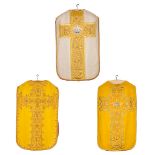 A collection of 3 Roman Chasubles, decorated with embroidered floral images in thick gold thread. (