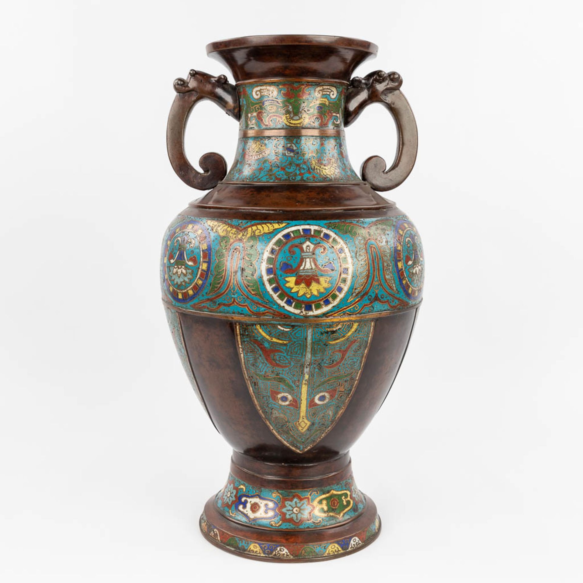 A large Oriental vase made of bronze with champselvŽ decor. (H:60 x D:36 cm)