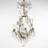 A large chandelier made of bronze and glass. 19th C. (H:130 x D:72 cm)