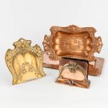 A collection of trays and table accessories made of copper in art nouveau style (L:43 x W:27 cm)