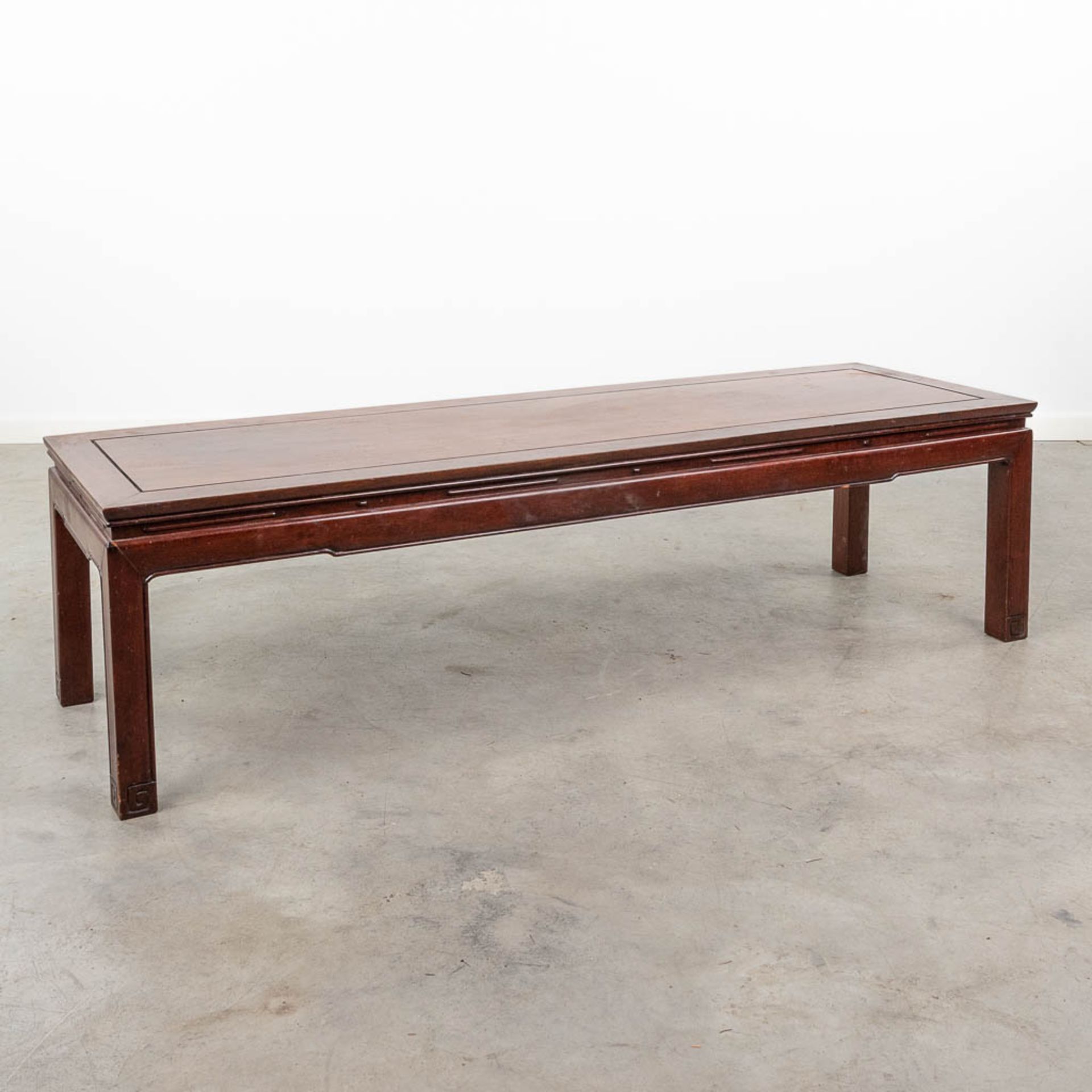 A Chinese coffee table made of hardwood. (L:46 x W:153 x H:41 cm)